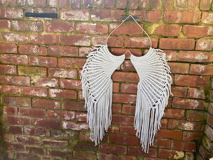 Macrame angel wings representing protection and love