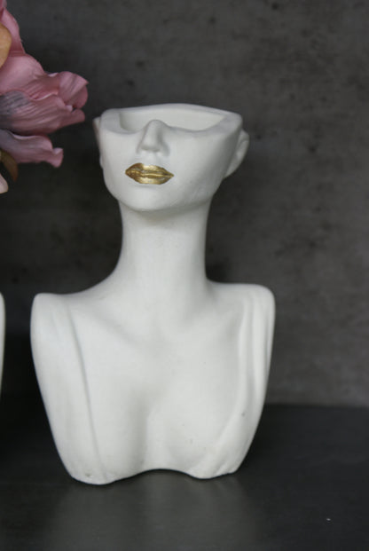 Woman half face bust vase