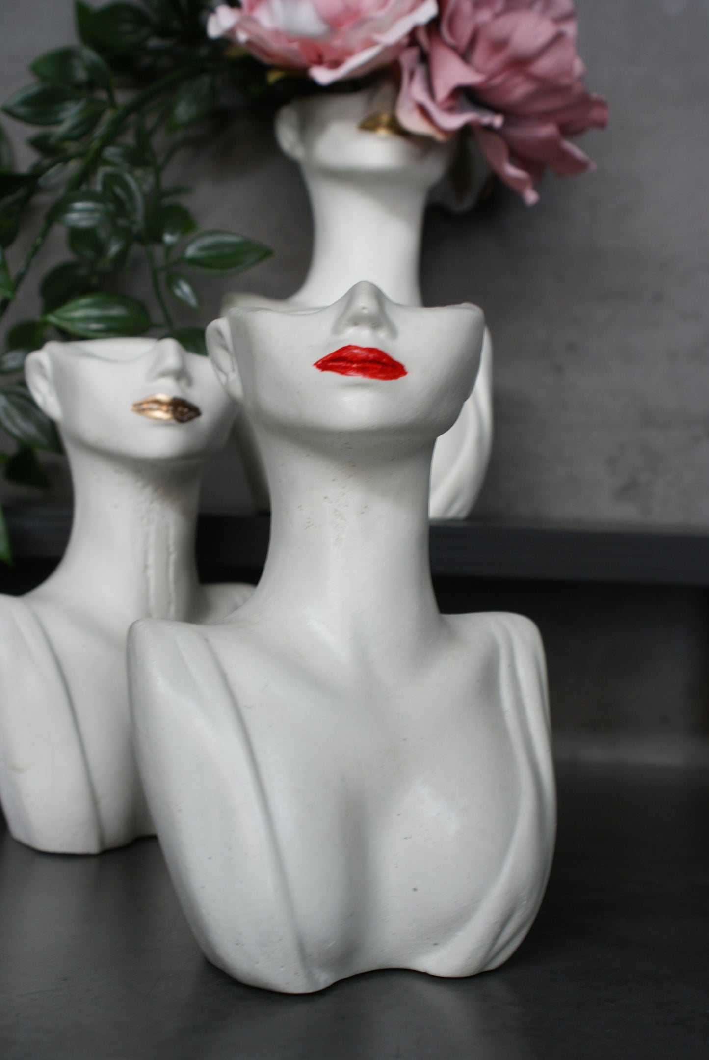 Woman half face bust vase