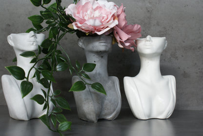 Woman half face bust vase