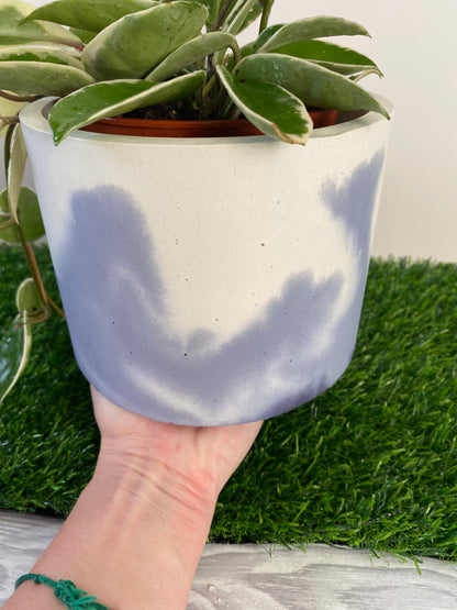 Marble effect round large concrete plant pot