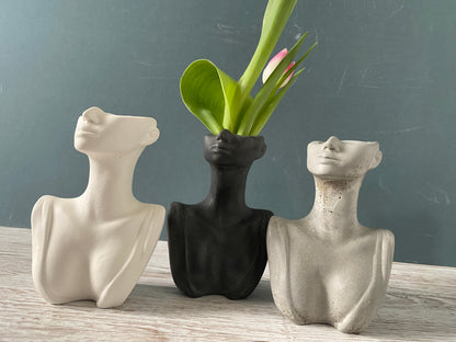 Woman half face bust vase