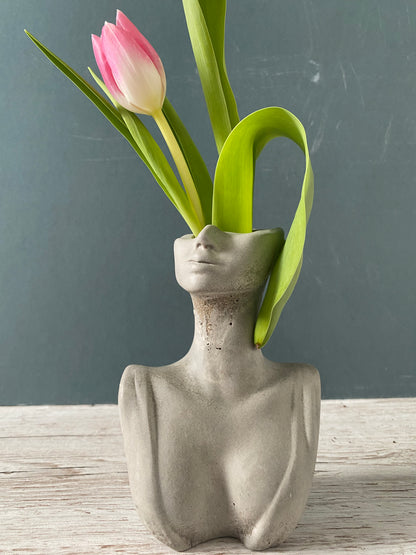 Woman half face bust vase