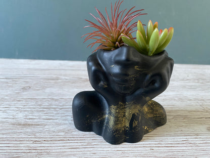 Woman half face succulent air plant vase