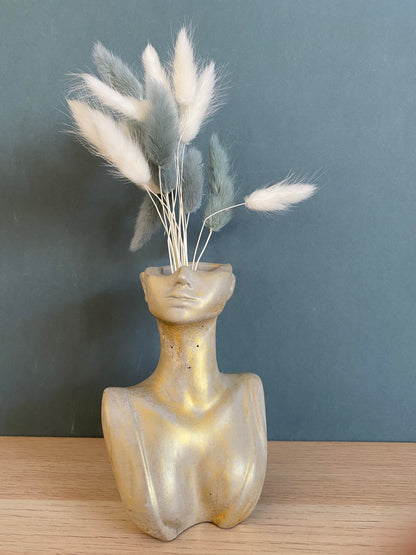 Woman half face bust vase