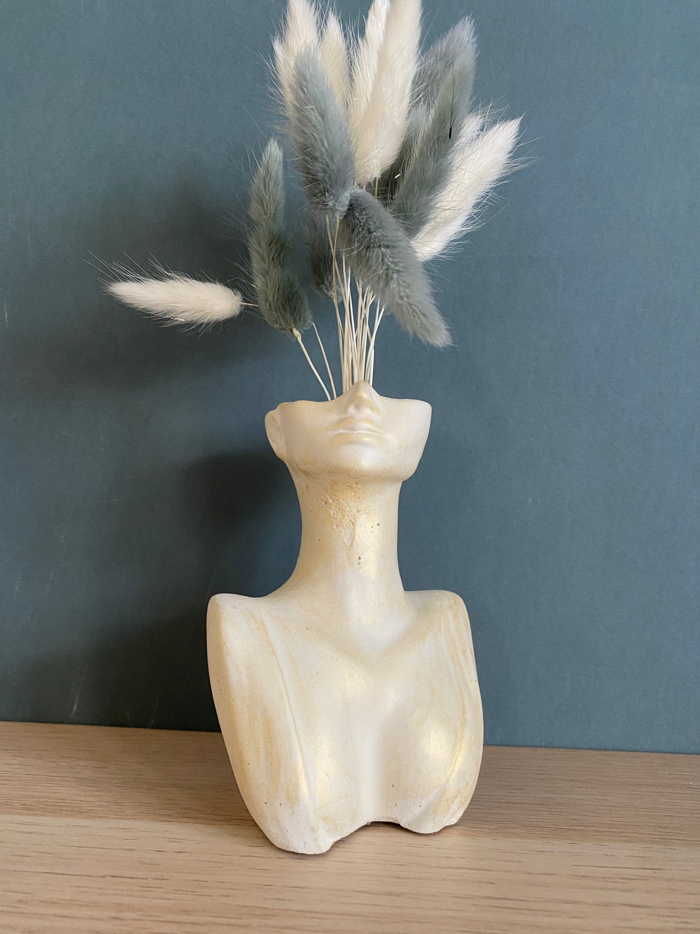 Woman half face bust vase